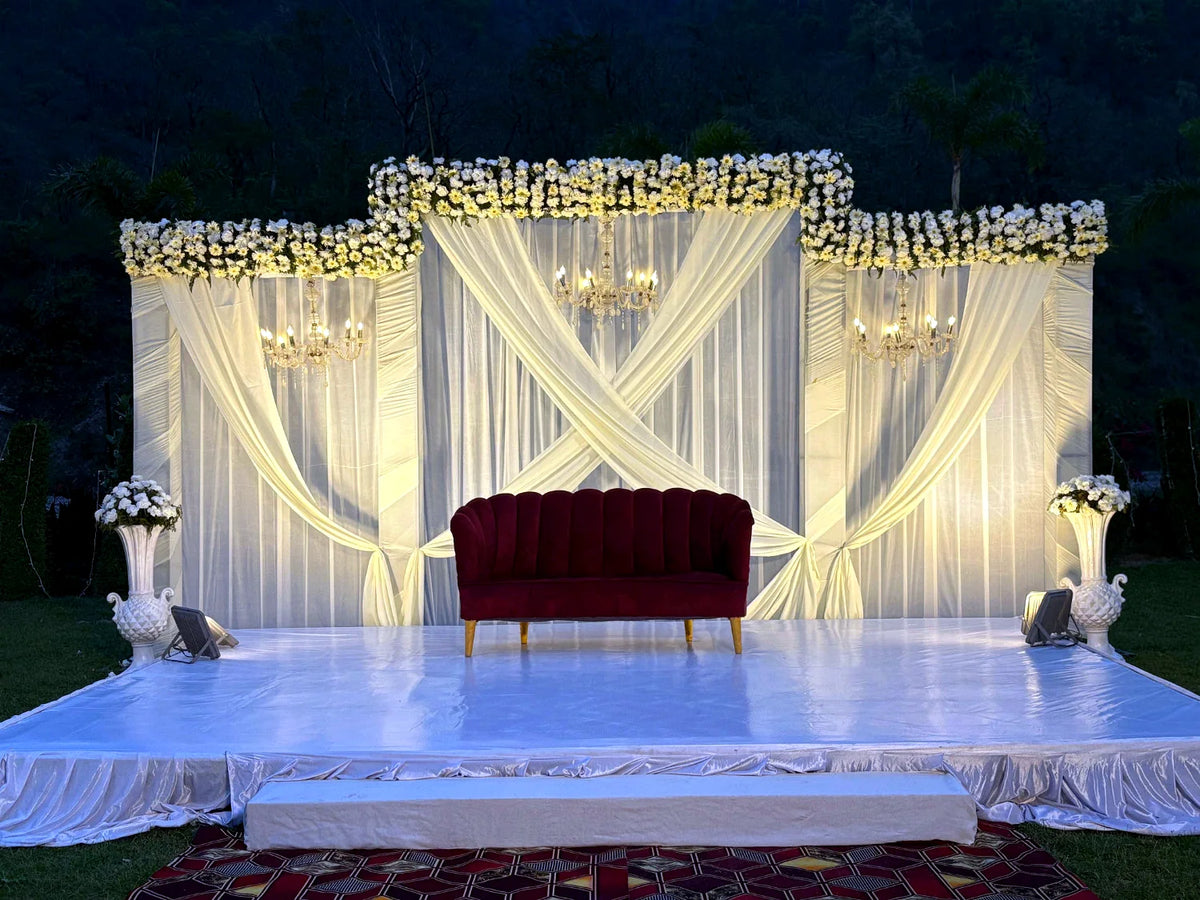 Ivory Draped Wedding Stage with Florals