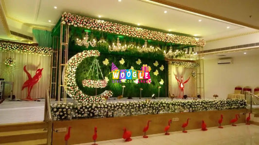 Green Mat Background With Golden Flowers Naming Ceremony Decor